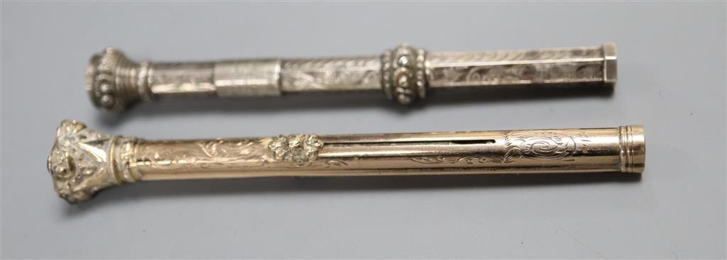 A Victorian gold overlaid telescopic pen/pencil and a silver pencil dated 1848